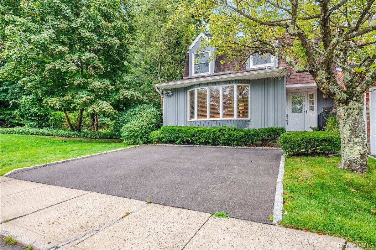 Beautifully updated and maintained Cedarwood Model, End Unit, located within the sought after Syosset School District.