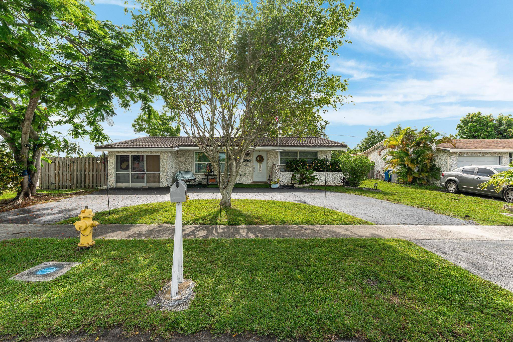 Beautifully updated Pool home with Eat in Kitchen and 1 Car Garage.