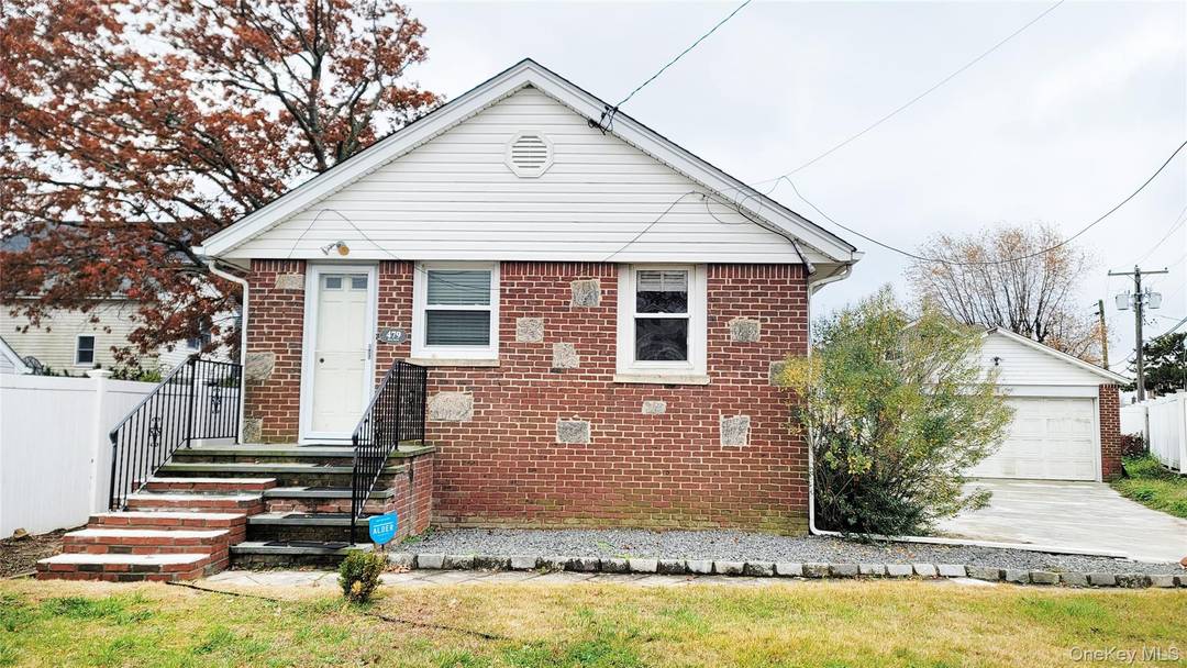 Welcome to this charming brick bungalow nestled on a quiet cul de sac in the heart of Oceanside.