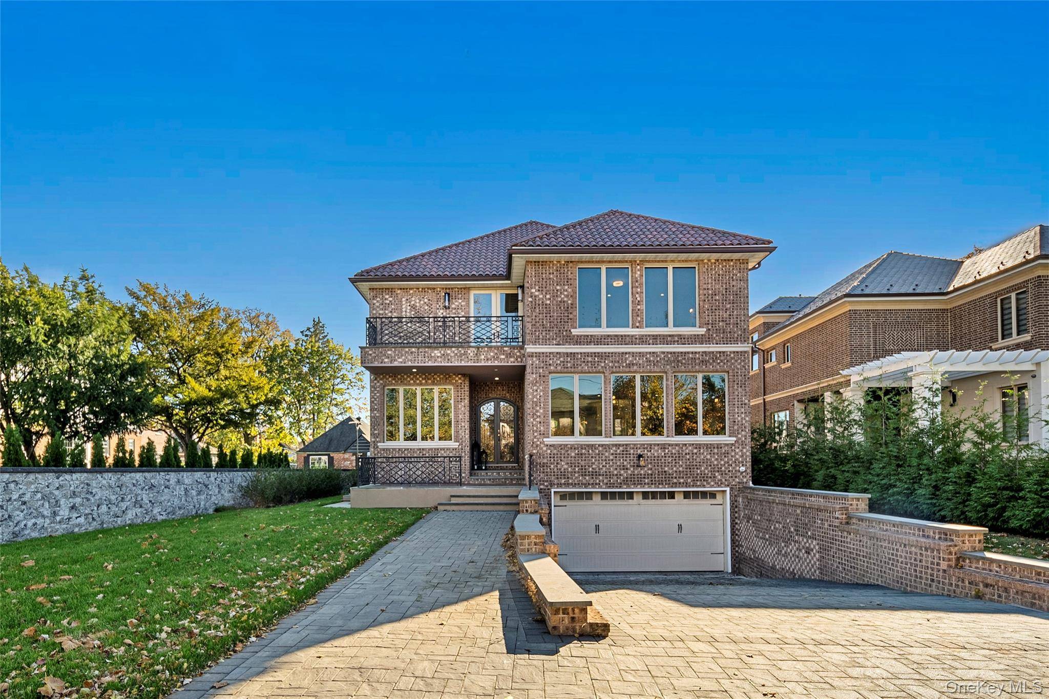 Custom full brick Colonial built in 2020 on a rare 11, 086 SF lot.