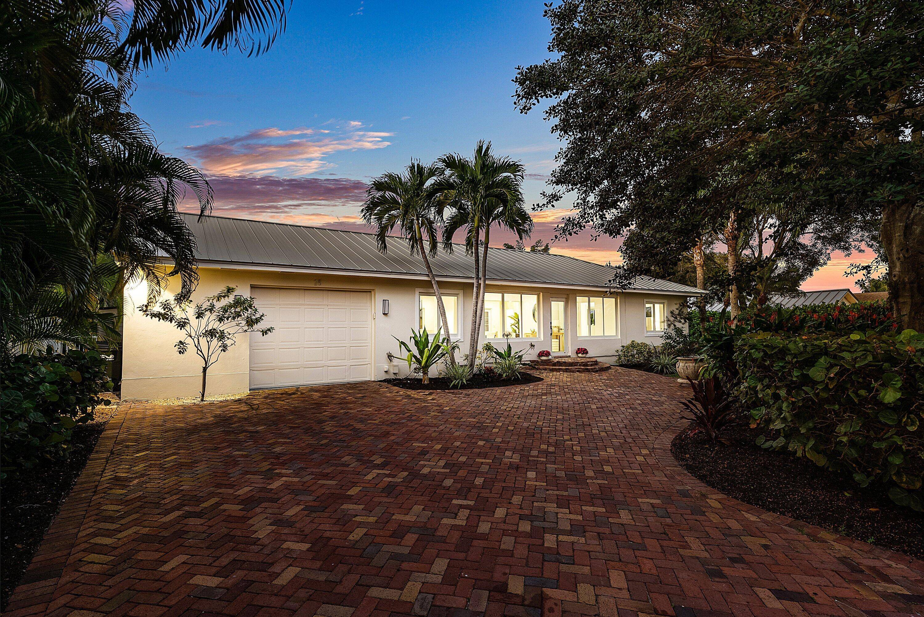 Discover the COASTAL ELEGANCE in this newly renovated 4 4 1.