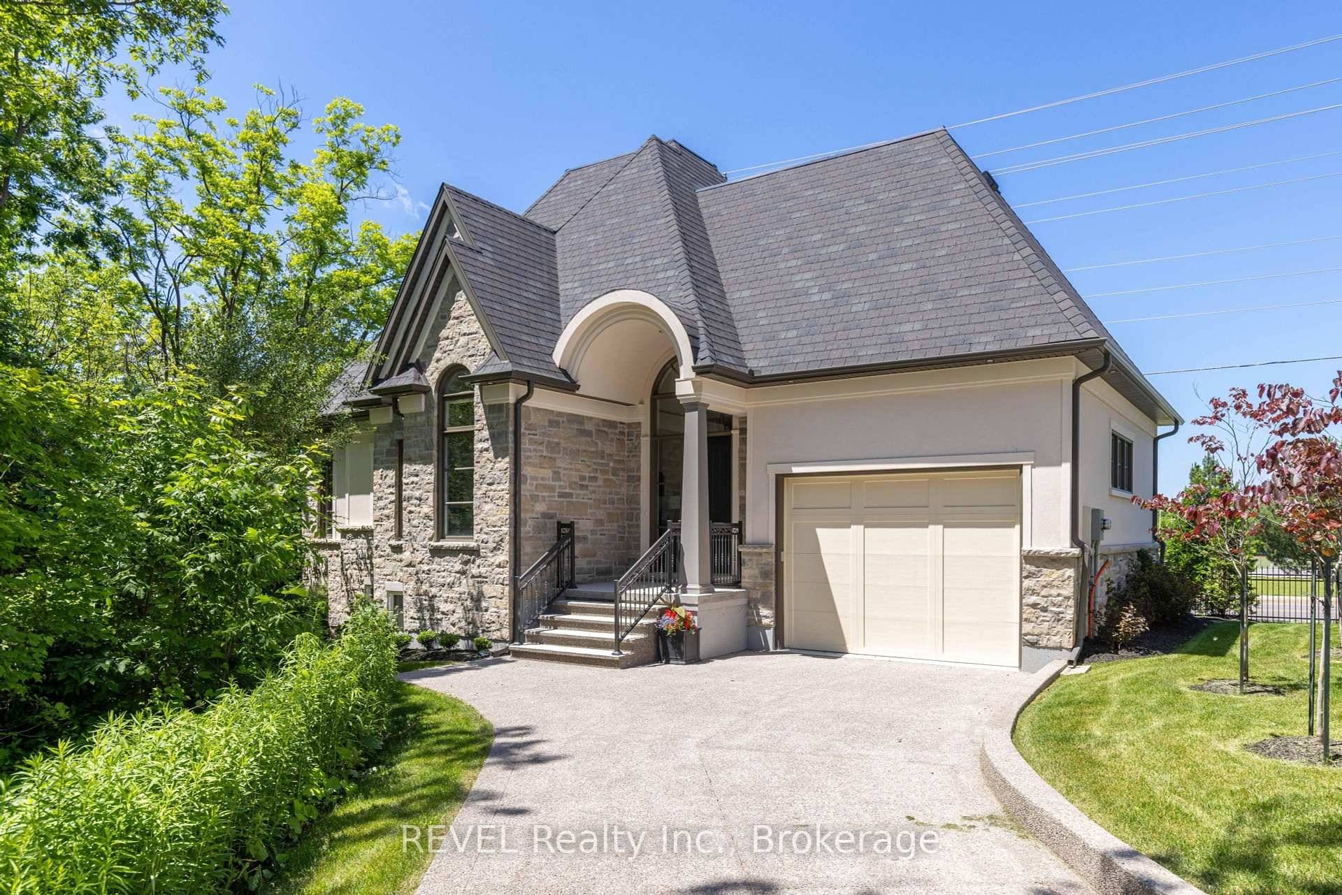 Nestled in a stately village, this newly built home exudes charm and sophistication.