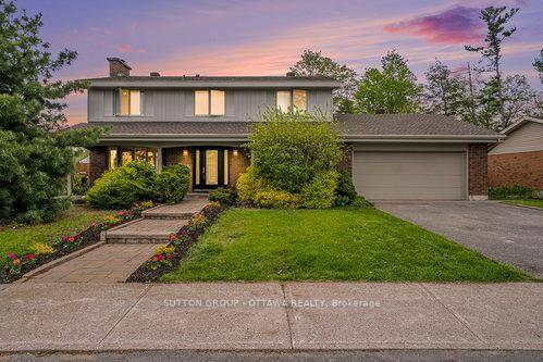AMAZING, well maintained home backing onto RAVINE GREENSPACE in popular ARLINGTON WOODS !