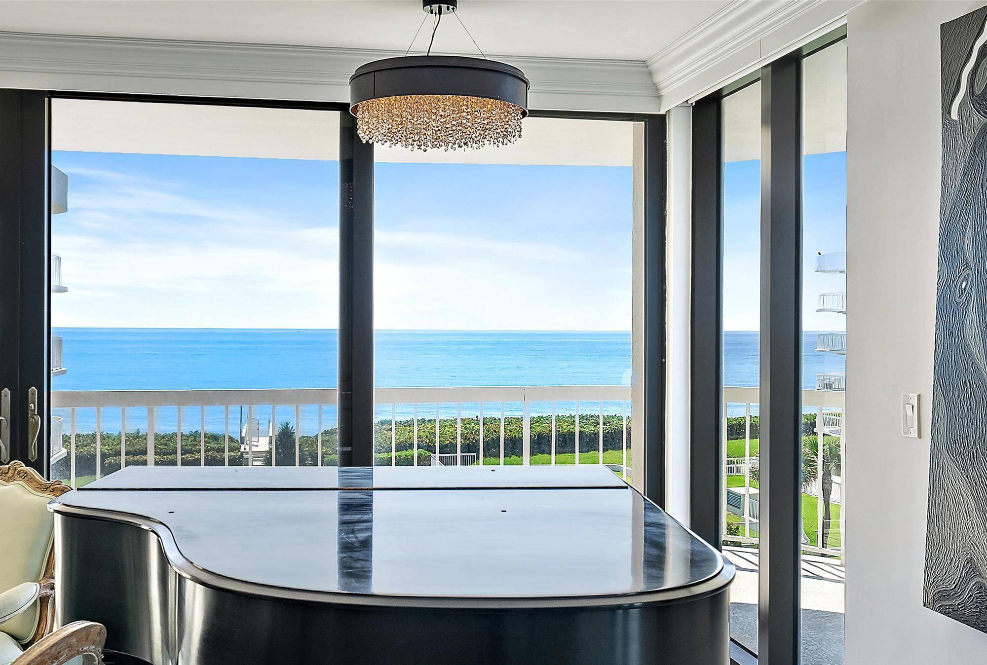 Enjoy breathtaking ocean and Intracoastal views from this beautifully renovated and fully furnished 2 bedroom ''den area'', 2.