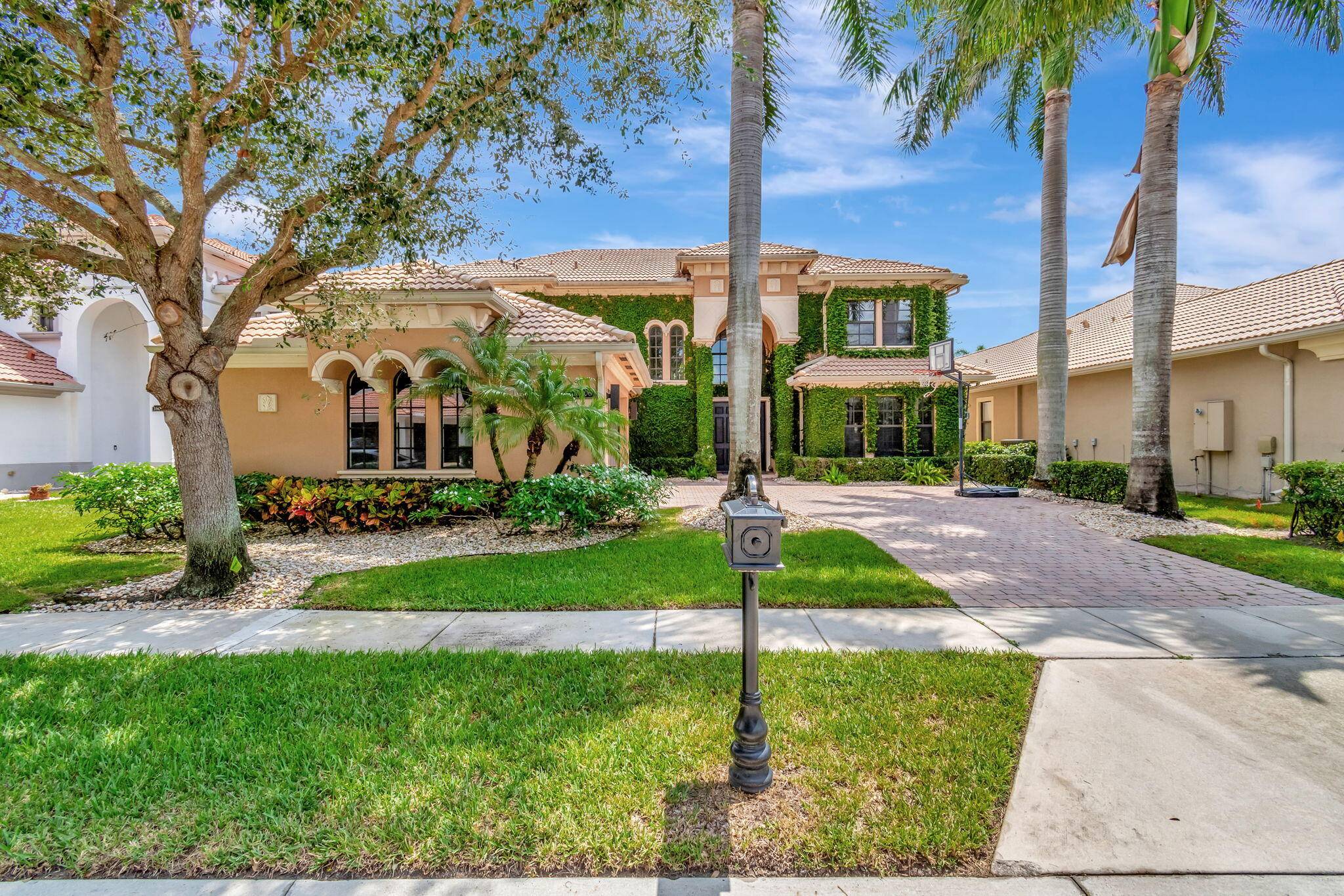 This impressive two story estate is located in the highly desirable Casa Bella community, situated at 16106 Rosecroft Terrace in beautiful Delray Beach, Florida.