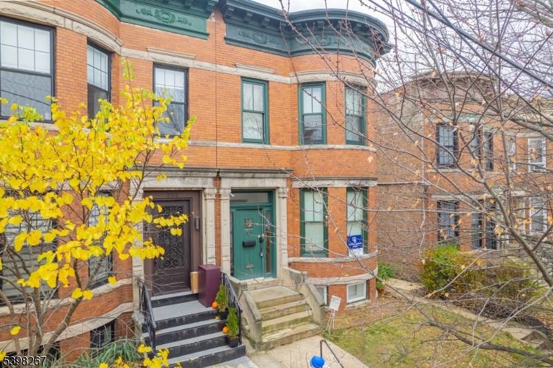 Stunning 5 Bedroom Brownstone with Finished Basement in Prime Jersey City Location.