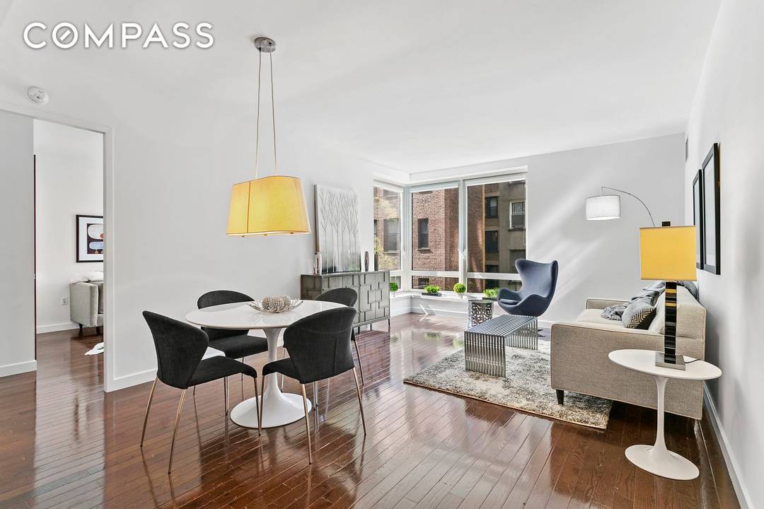 Residence 5A at the boutique Hudson Hill Condominium is a pristine true 3 bedroom, 2.