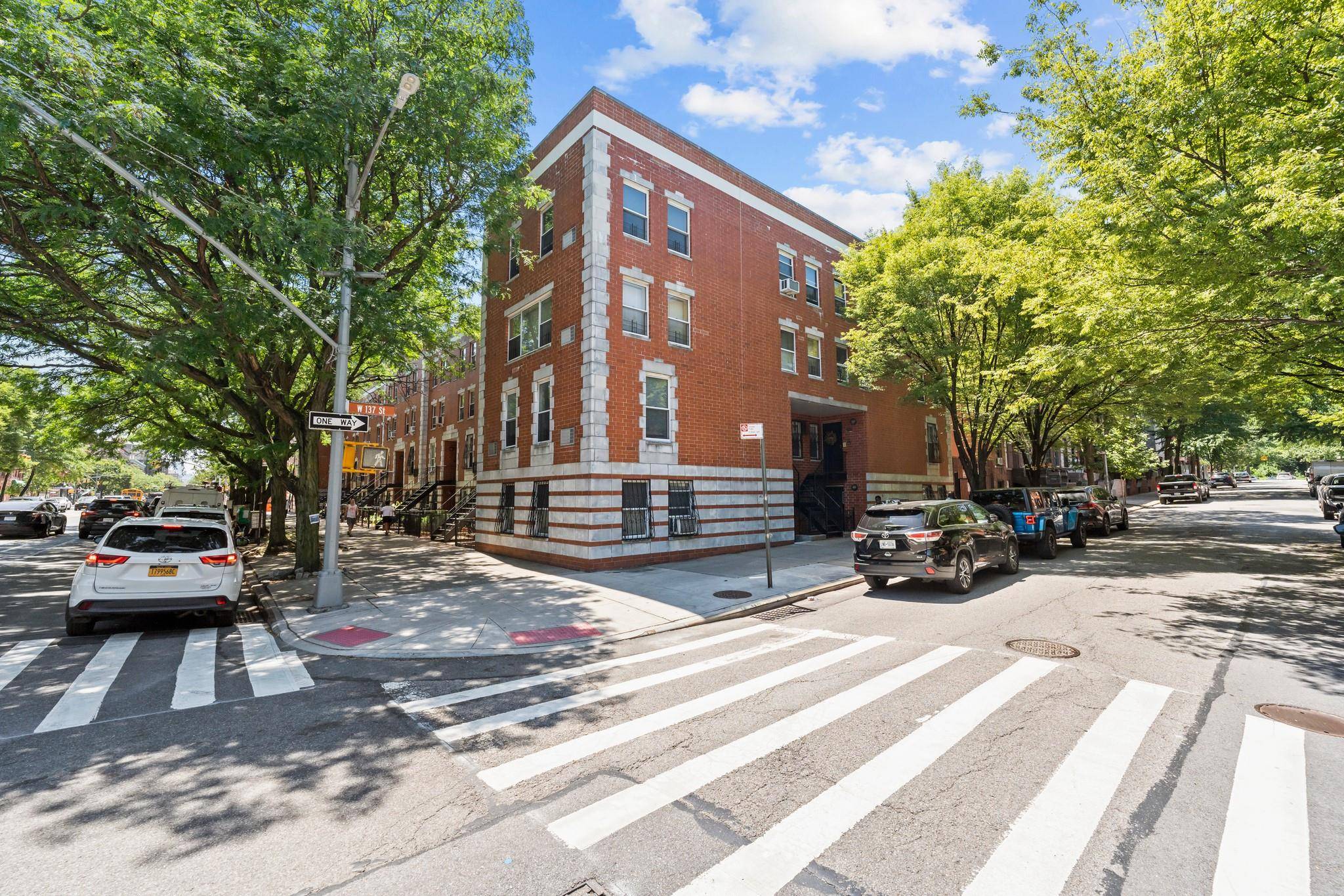 Harlem's best three bedroom duplex features bamboo wood floors, large open area, a dining room area, and a well lit living room.