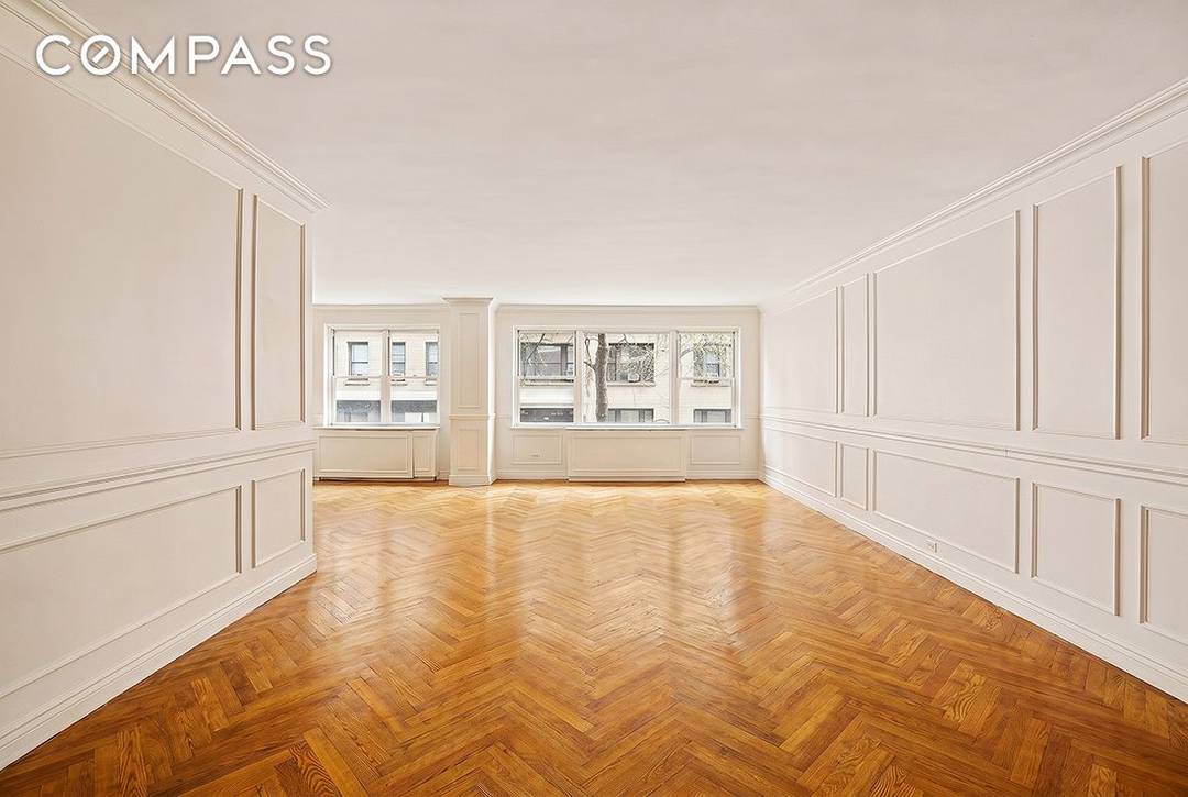 Welcome to Apartment 2C, a spacious two bedroom, two and a half bath home offering a classic layout and the flexibility to be converted to a three bedroom or office.