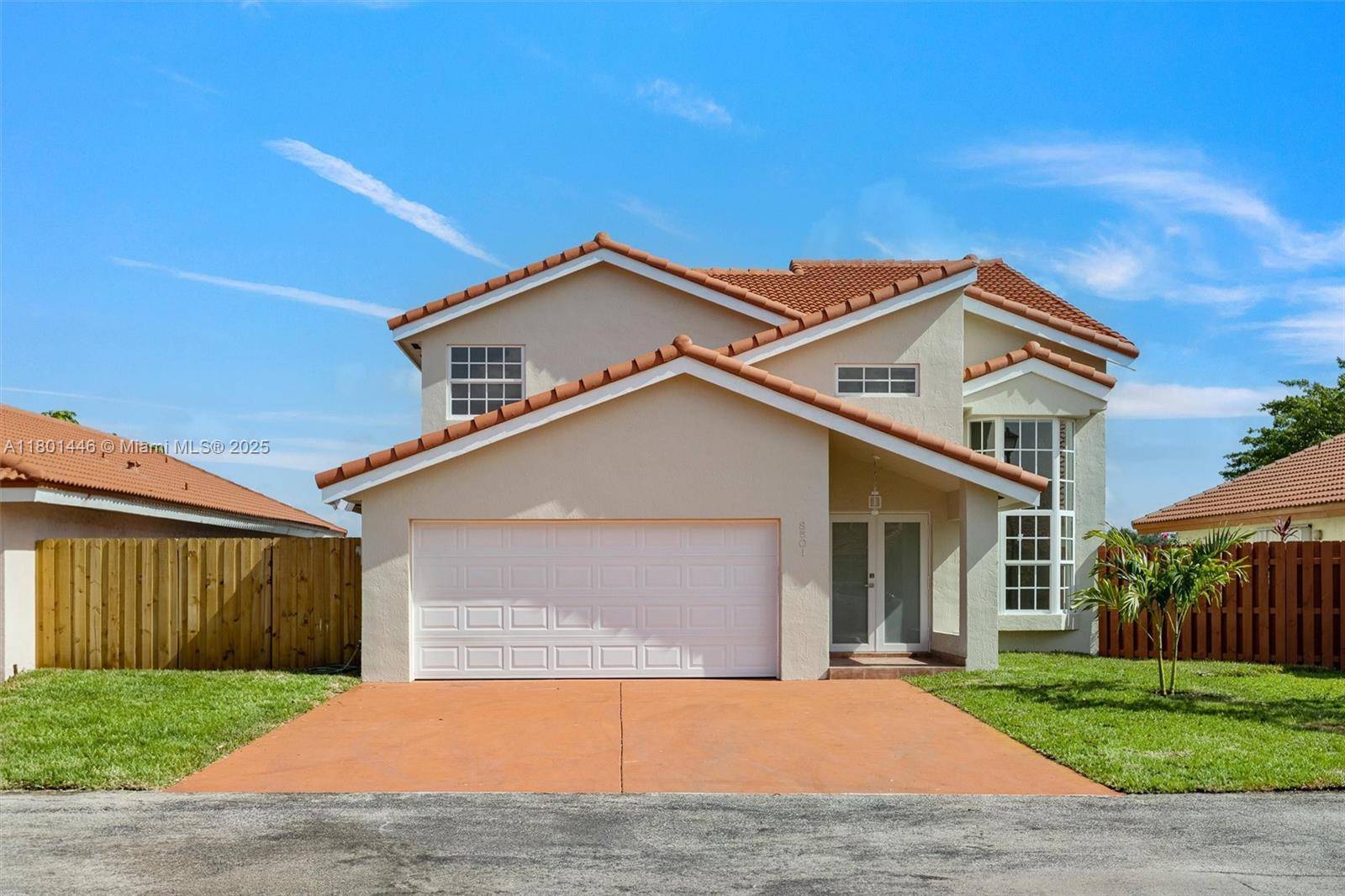 Discover modern elegance in this two story, renovated home at 8501 Northwest 191st Street, Hialeah, FL, nestled in the quiet Angelica Gardens gated community.