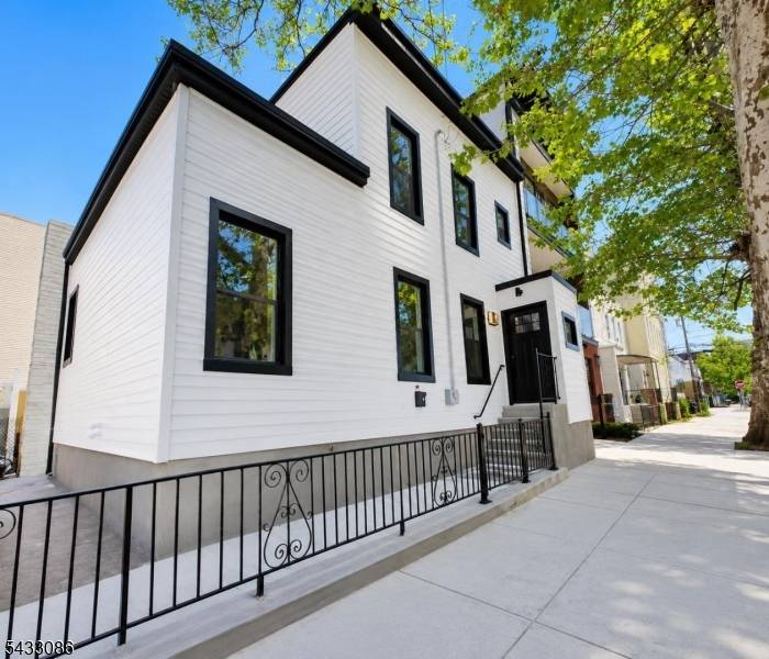 Rare opportunity to own a true single family home in the highly sought after Jersey City Heights no condo fees, just modern luxury, privacy, and incredible curb appeal.