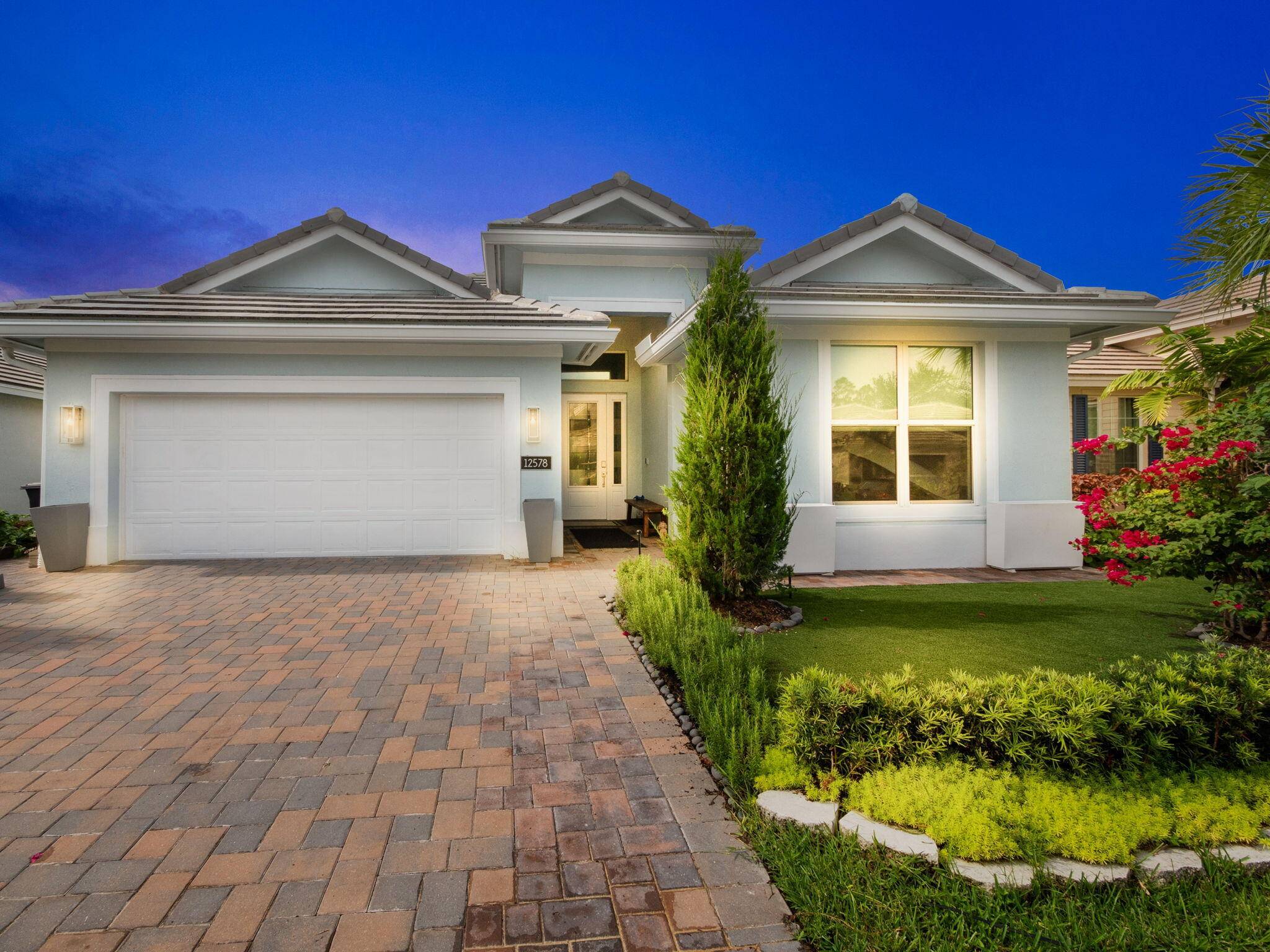 Welcome to your ideal home in the prestigious LakePark at Tradition, where luxury meets tranquility in this breathtaking 3 bedroom, 2 bathroom lakefront property.