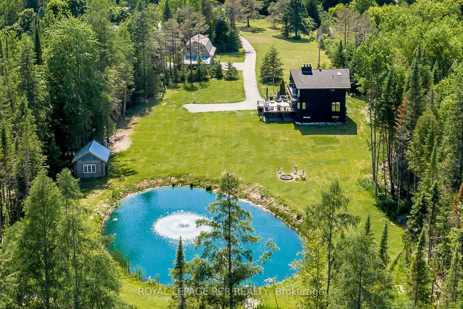 Wow ! 12 acres, recently renovated 4 level side split with finished basement with huge above grade windows, 5 garages 2 3 car garage, pond and detached 1600sf two storey ...