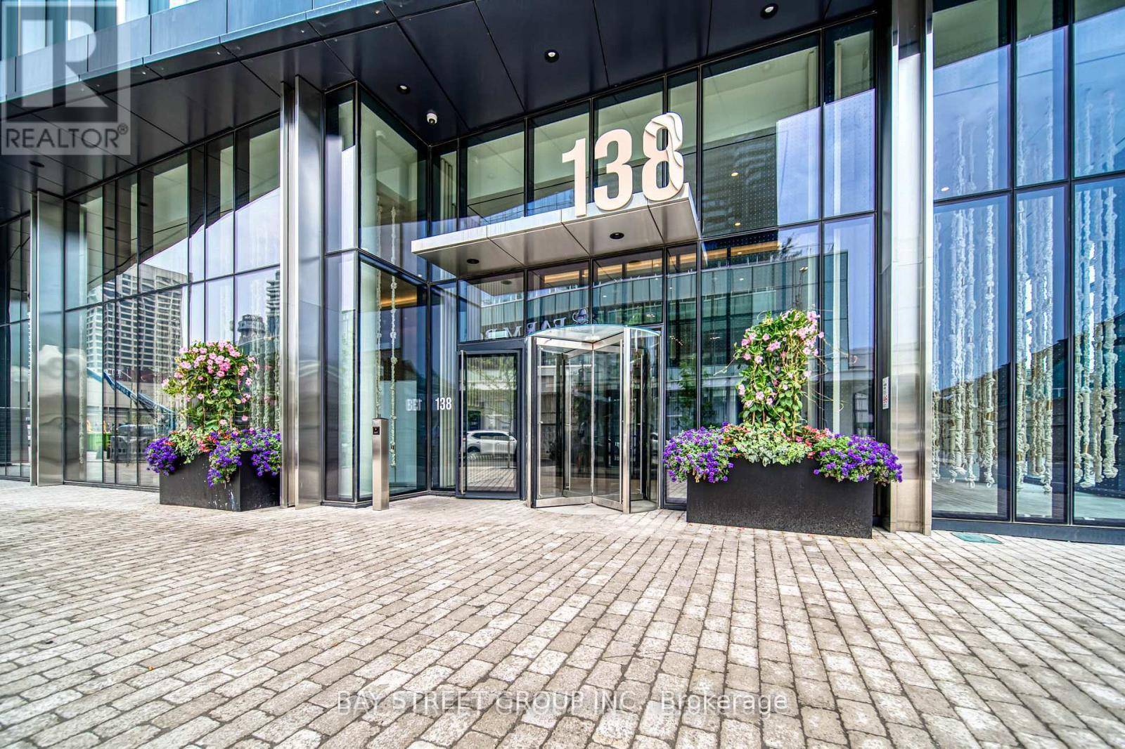 Welcome To This Spacious Two Year New Suite at Most Sought After Sugar Wharf East Tower By Menkes !