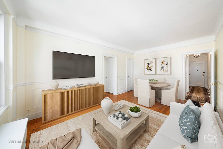 Located on a high floor in a pre war building in the Lincoln Center area, this spacious bright one bedroom has a well proportioned living dining room with beautiful open ...