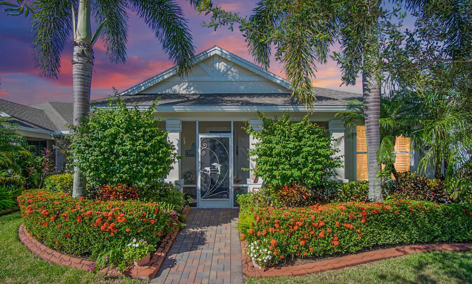 Come enjoy Porch Living in this beautiful Key West style home in the desirable area of Bedford Park in Tradition.