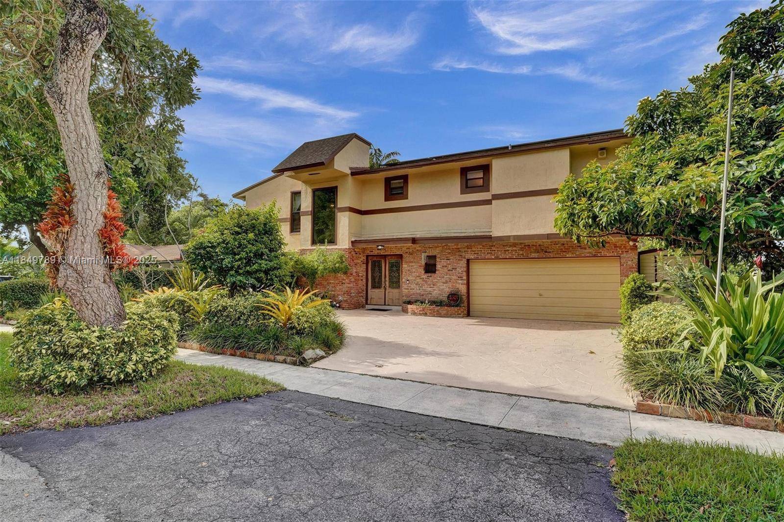 Welcome to your dream home in the heart of Cooper City !