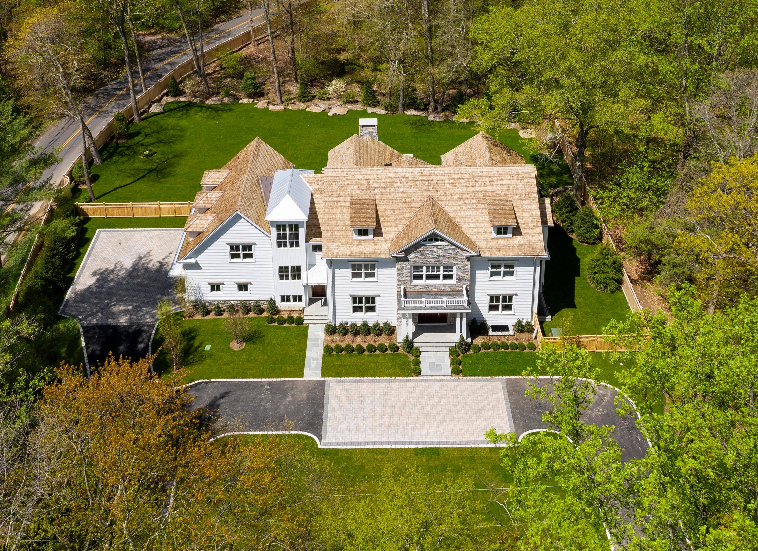 Sophisticated new construction with Smarthome capabilities, 10' ceilings, open floor plan quality finishes, located on a cul de sac just minutes from Greenwich Ave.