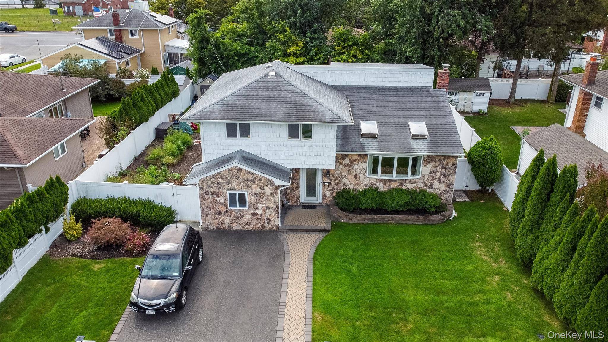 This beautifully maintained single family split level home offers 4 spacious bedrooms and 2 full bathrooms in the desirable Hicksville School District.