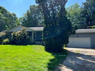 Nestled on a rare 1 acre lot along a quiet street, this charming 3 1 bedroom, 2 bath bungalow offers over 1, 600 sq.