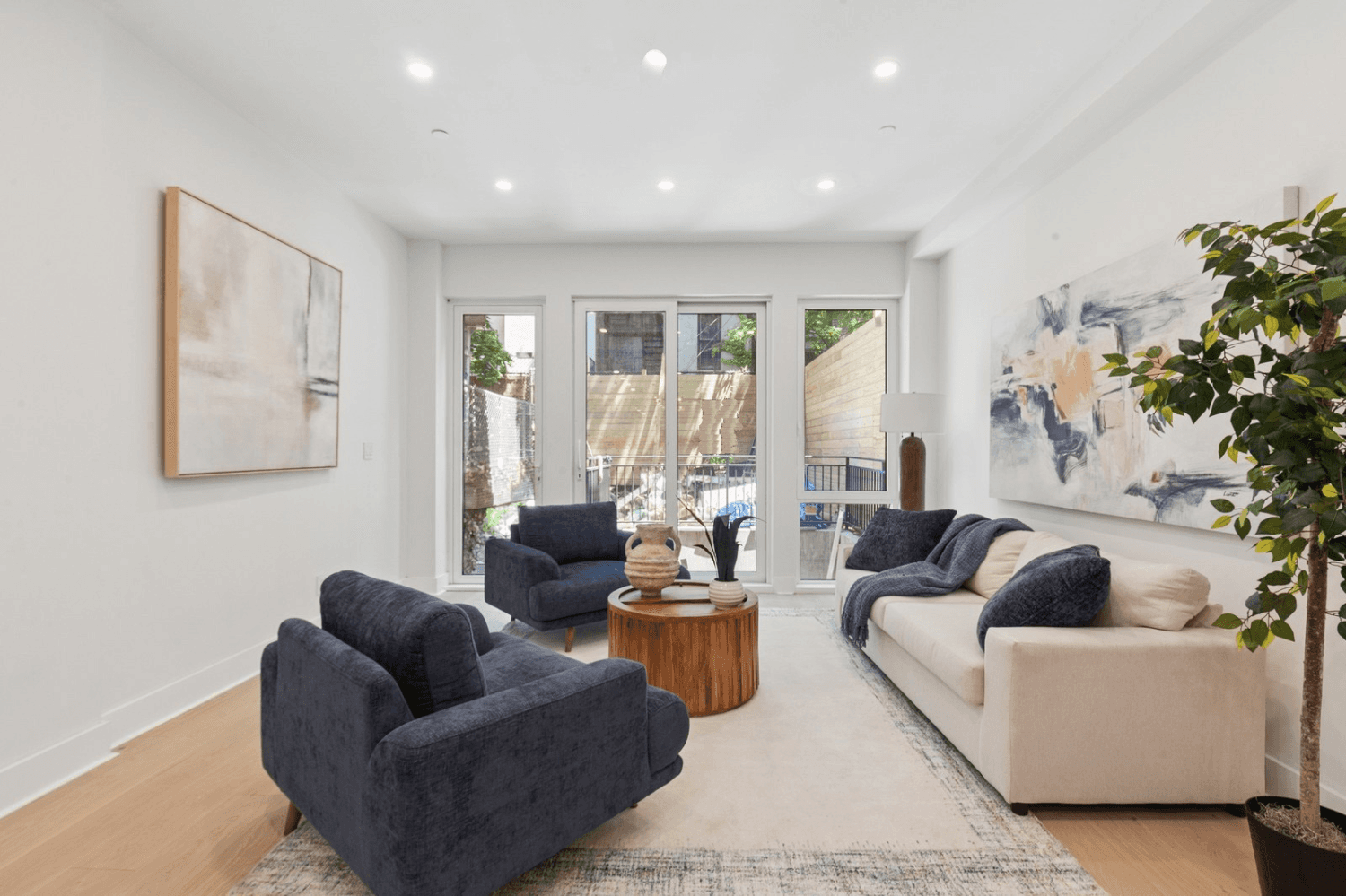 Welcome to a rare opportunity to own a stunningly reimagined townhouse condo conversion in the heart of Central Harlem.