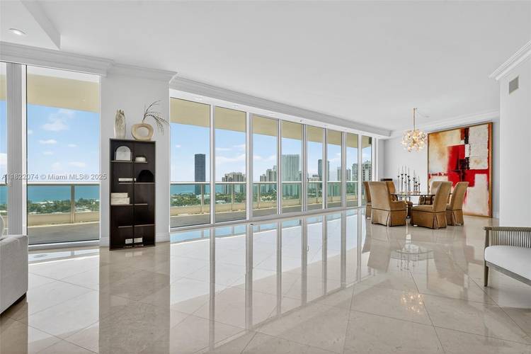 ENTER AVENTURA'S MOST PRESTIGIOUS ADDRESS PORTO VITA TO PRIVATE ELEVATOR FOYER AND BE WOWED BY THIS RARELY SEEN 5, 141 SQFT RESIDENCE.