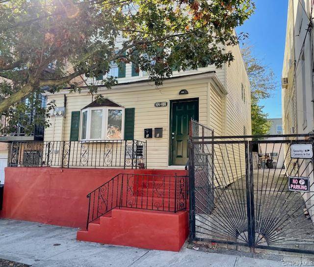 Great opportunity to own this bright and airy legal 2 Family with large backyard.