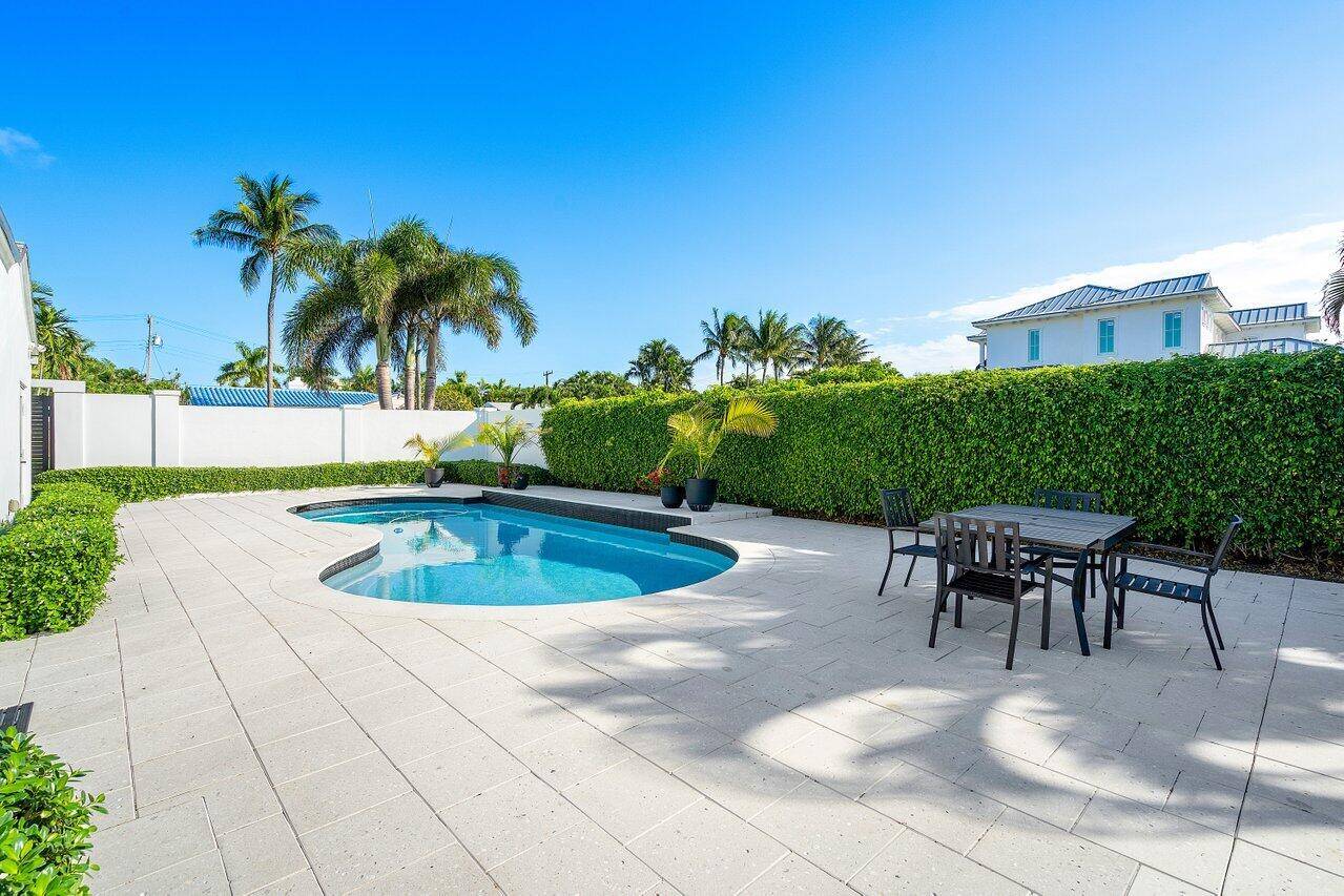 Welcome to 1108 Miramar Drive, a jewel situated on one of Delray Beach's most coveted streets.