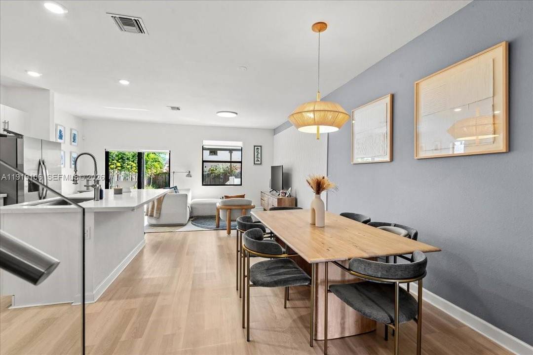 Stop the car, this is the perfect home for those that want to do nothing before moving in, decorator touches throughout, glass railing, closet organizers, converted garage to office or ...