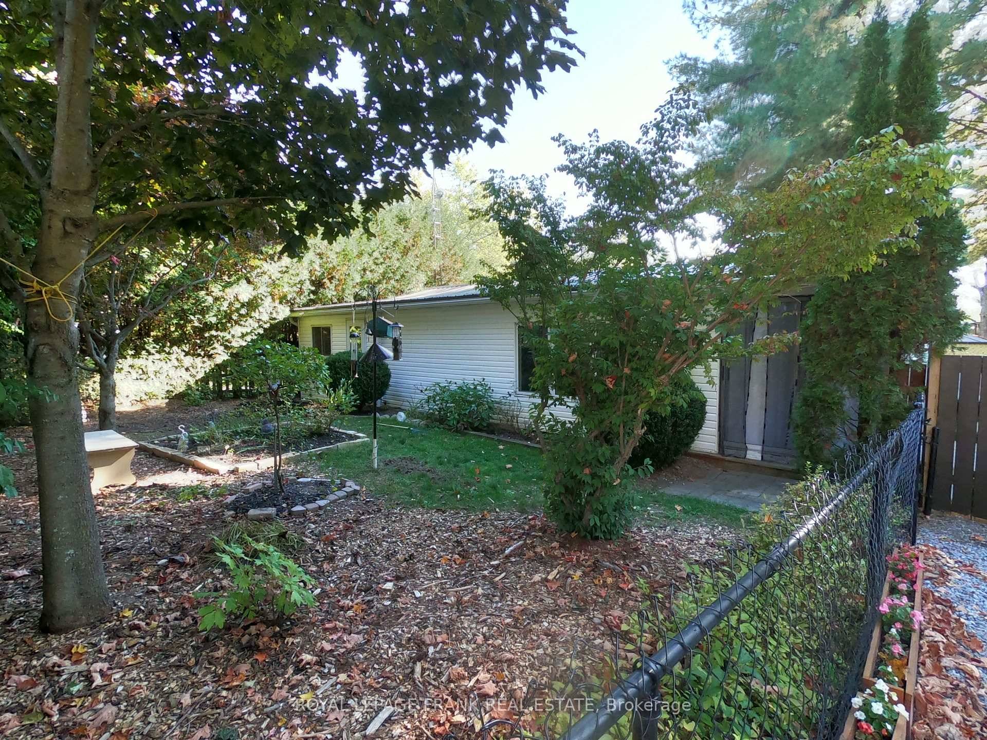 Enjoy your affordable country, cottage life in this attractive amp ; nicely appointed 2 bedroom mobile home with private fenced yard amp ; gardens with designated on site parking, fire ...