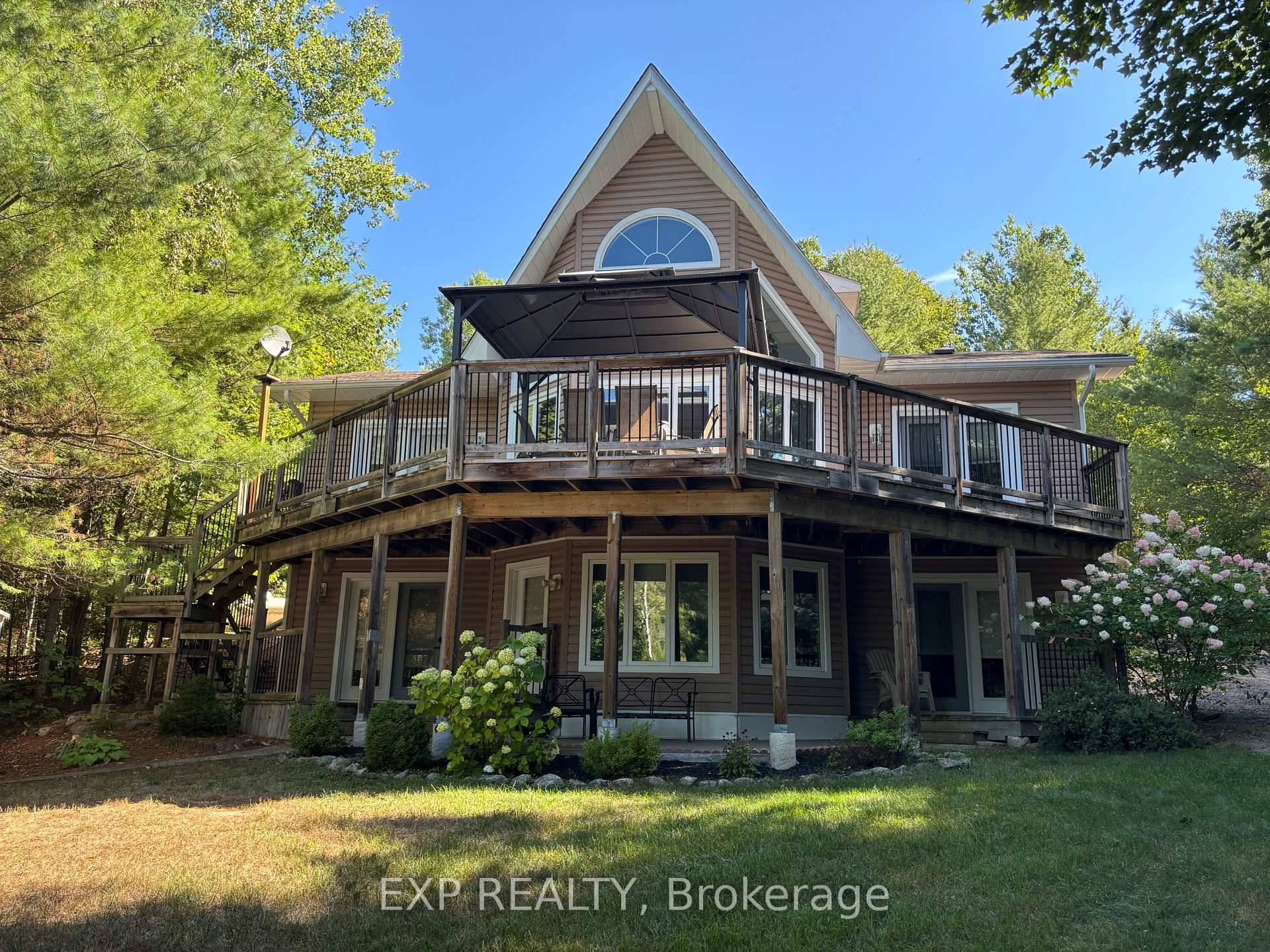 Quiet quality and thoughtful design define this 4 season, 4 bedroom home or cottage on the sought after shores of spring fed Carson Lake.