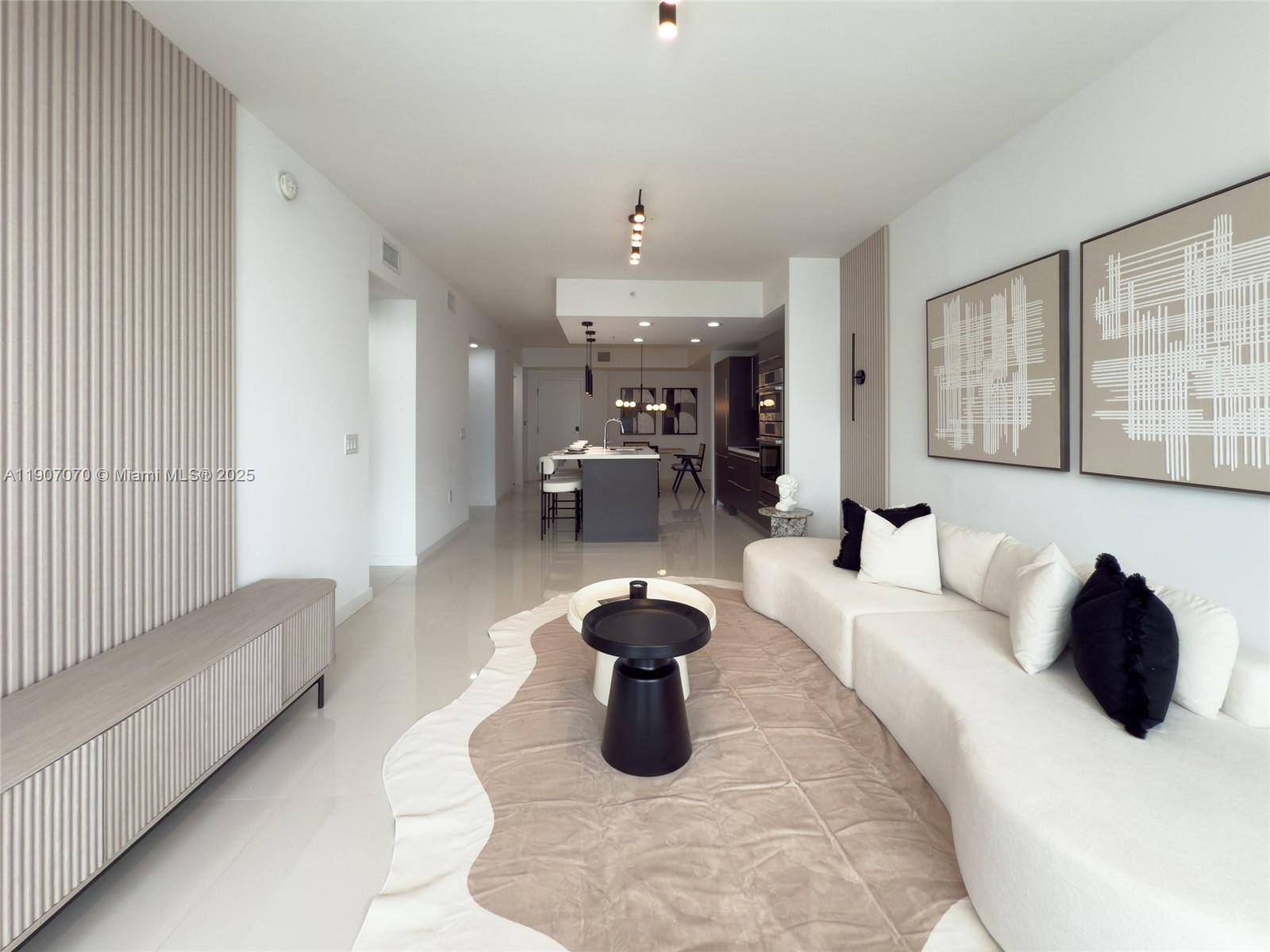 Located in the heart of Midtown Doral 2, this elegant fifth floor apartment offers a luxurious living experience with Japandi design a refined blend of modern and natural elements.