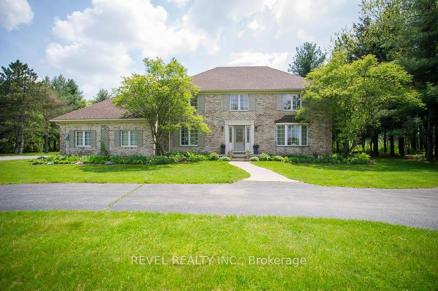 Located in the prestigious Highland Estates community sits 92 Highland Drive, a gorgeous 2 storey, brick home situated on more than 2 acres of mature tree landscape amp ; ravine.