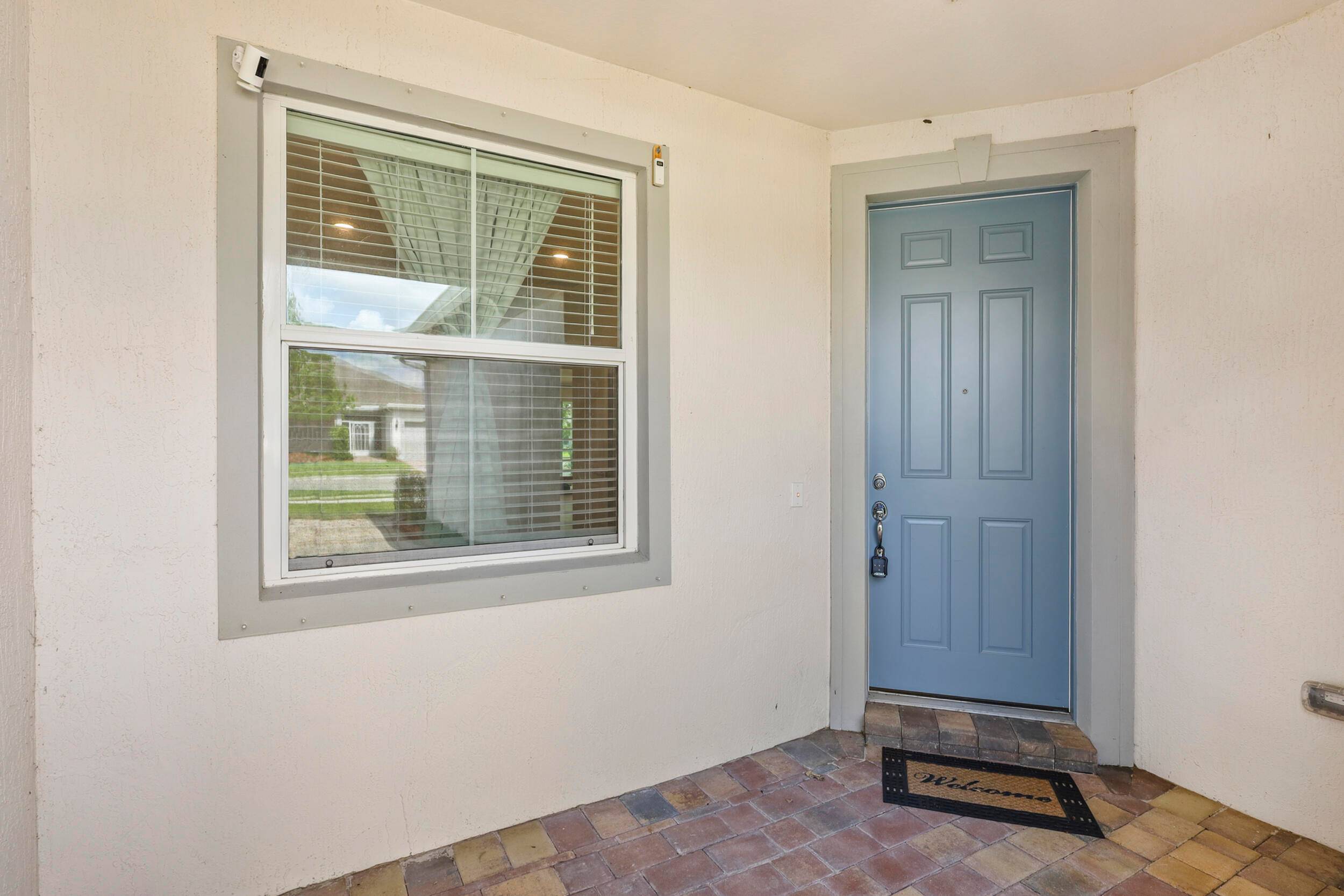 This beautiful home boasts a water view PLUS the lowest price you'll find in the prestigious Del Webb 55 gated community !