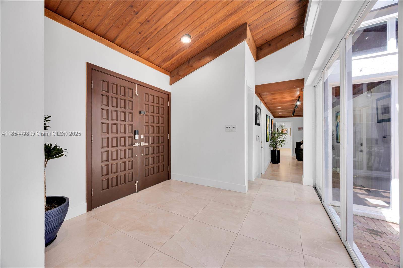 Charming 2 story family home in Pinecrest has 3, 883 sq feet of living area.
