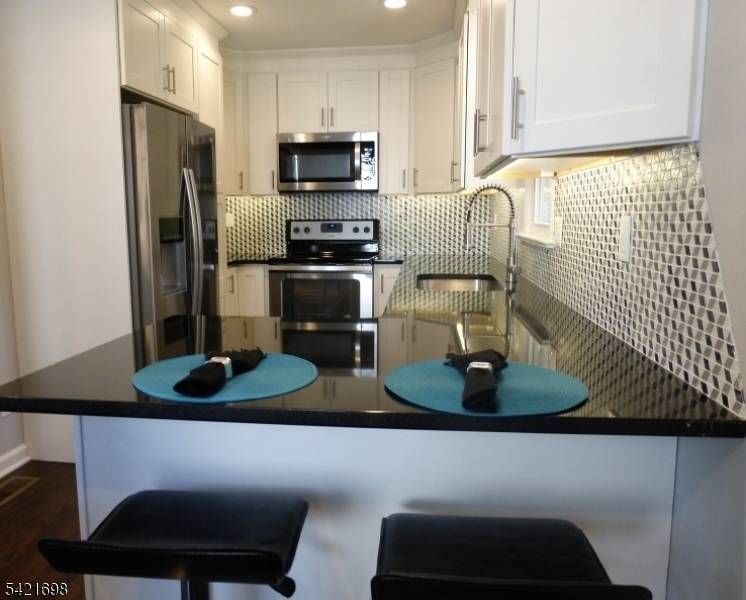 Welcome to this beautifully renovated 3 bedroom Ranch located in the sought after Beacon Hill section of Denville.