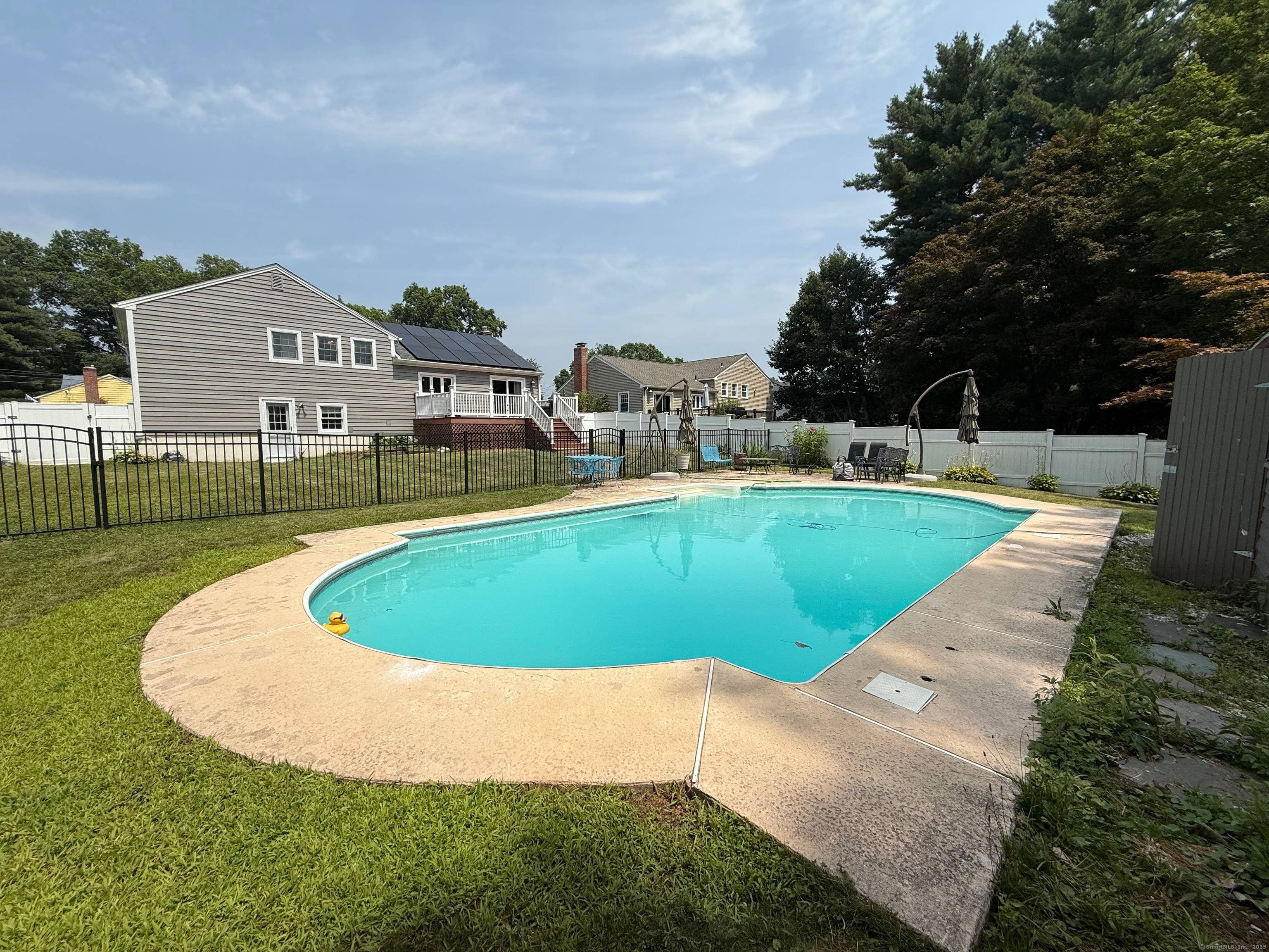 Located directly across from Aiken Elementary School, this beautifully updated split level home blends everyday function with inviting style.