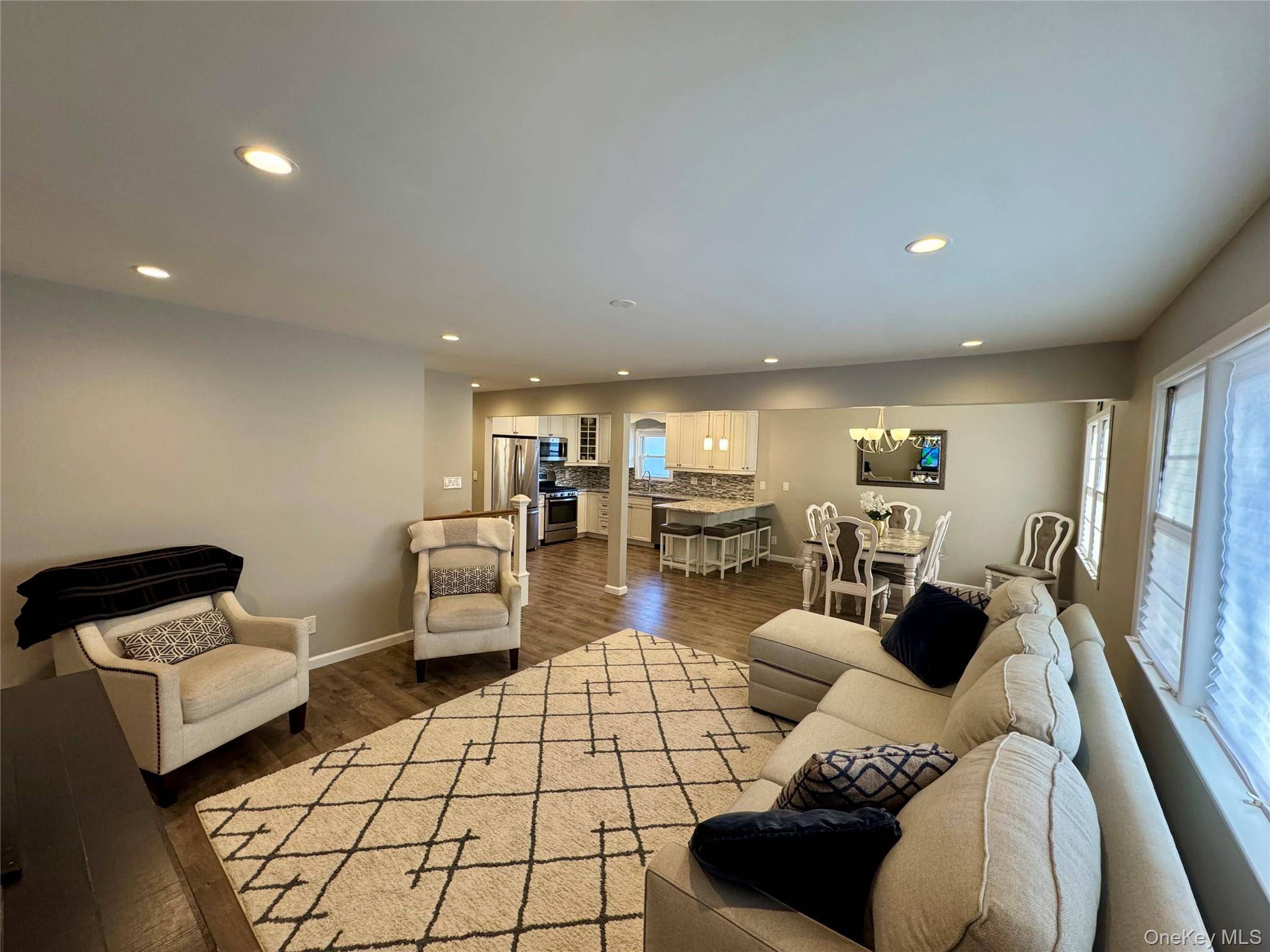 Welcome to this Newly Renovated Modern Traditional Style High Ranch Home.