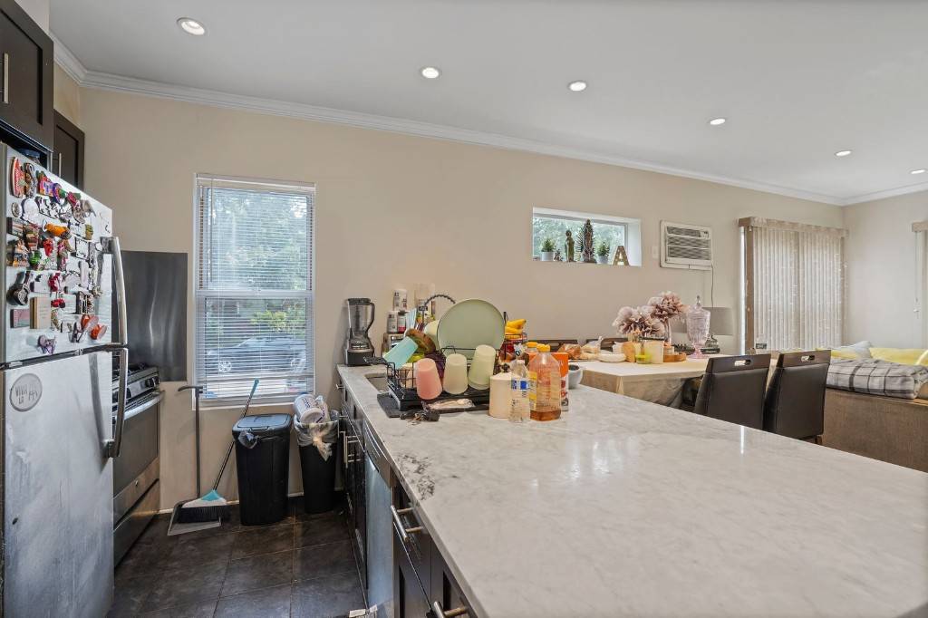 Large 2 Family home situated on a corner lot with 2 detached garages.