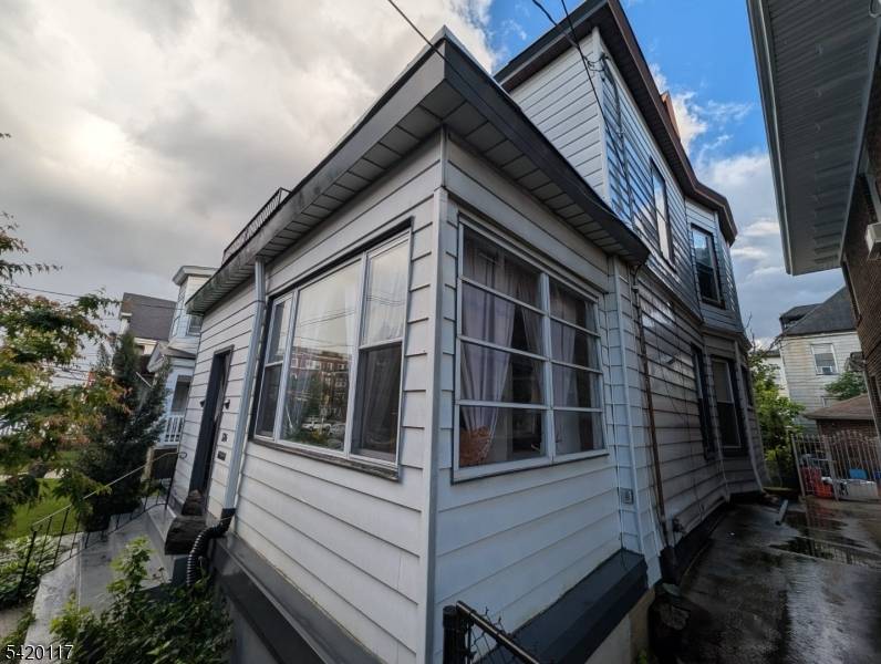 Welcome to this distinctive and well cared for Colonial style home in the sought after Forest Hill area of North Newark where character, space, and location come together effortlessly.