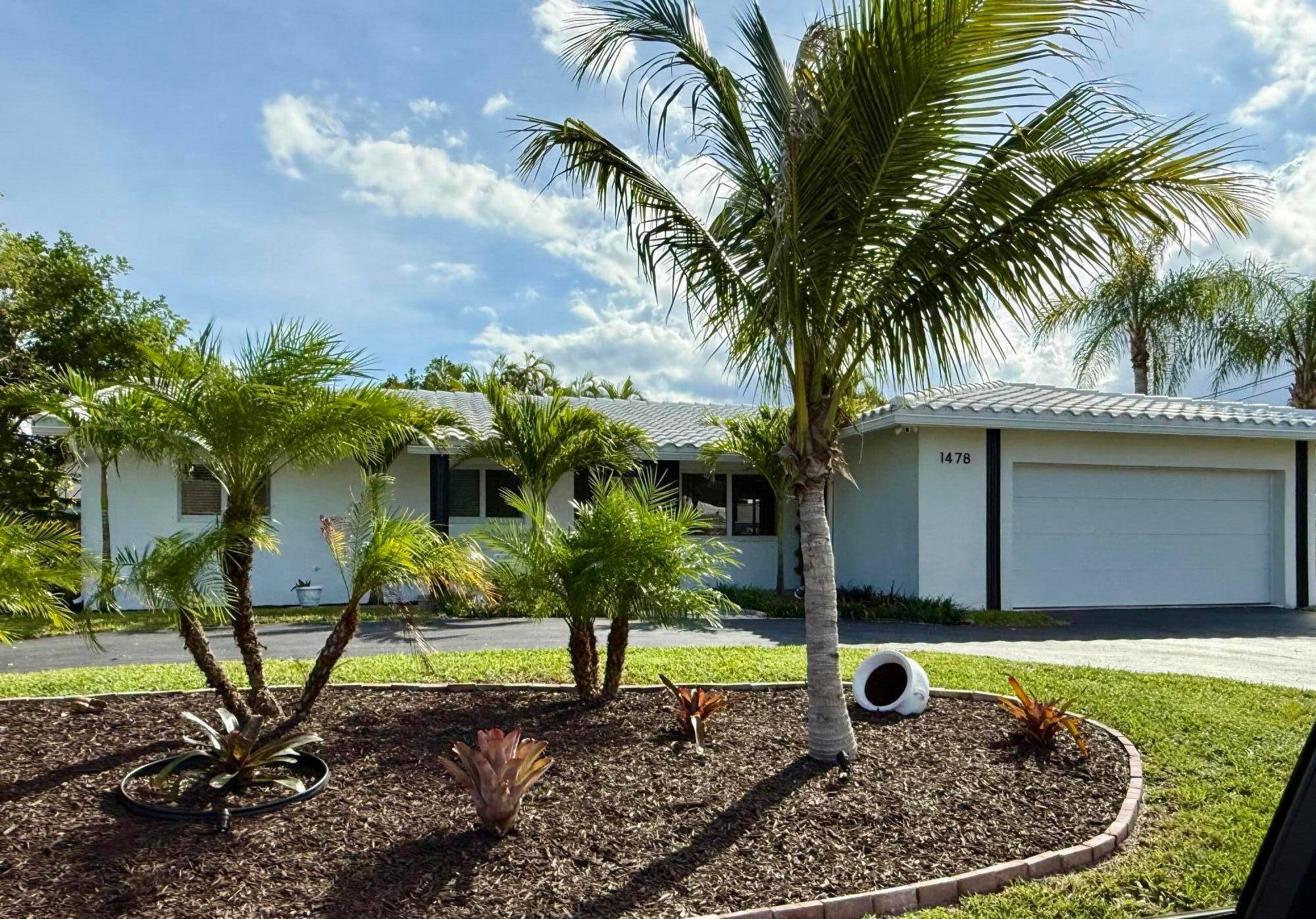 Professional Photos Coming Soon Coastal Paradise Awaits Fully Furnished Waterfront Pool Home in Coral Ridge Isles.