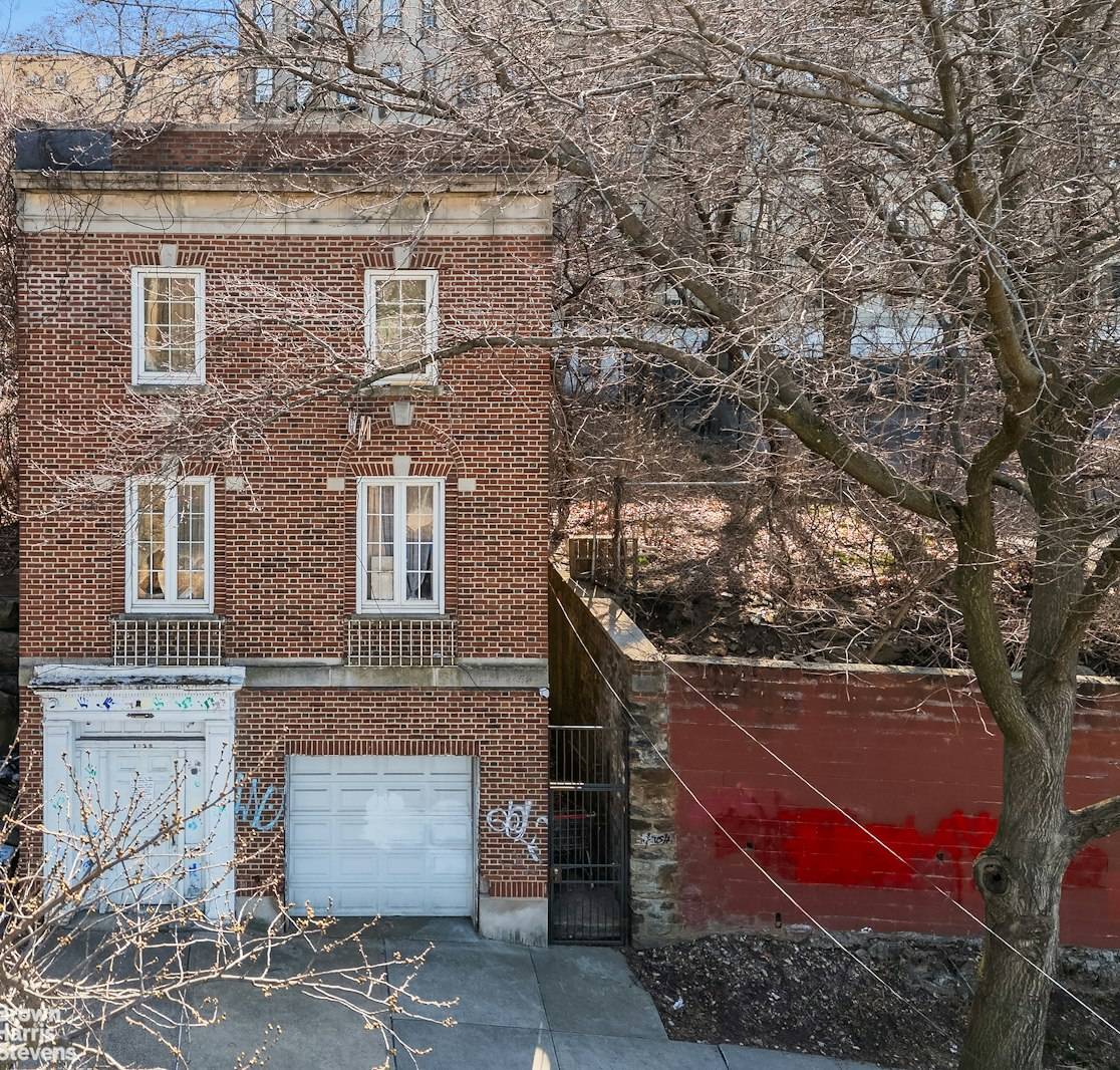 Two story prewar house available for purchase for renovation or as a new development site.