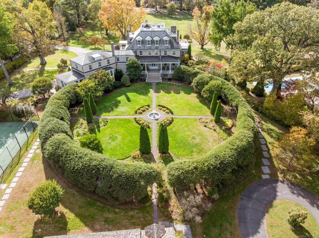 Tucked away on over 4. 5 private acres off Historic Mountain Spring Road this Georgian inspired estate is an extraordinary example of American architectural heritage.