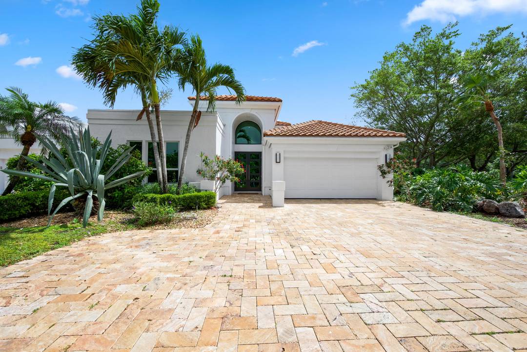 Gorgeous renovated one story home with wonderful patio pool great for entertaining along with a golf course view.