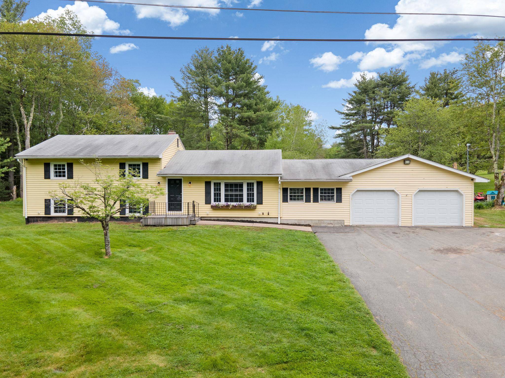 SPACIOUS RAISED RANCH WITH MODERN UPGRADES !