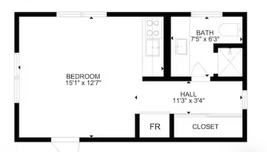 Fully operational, income producing property with four active units, plus adjacent buildable land.