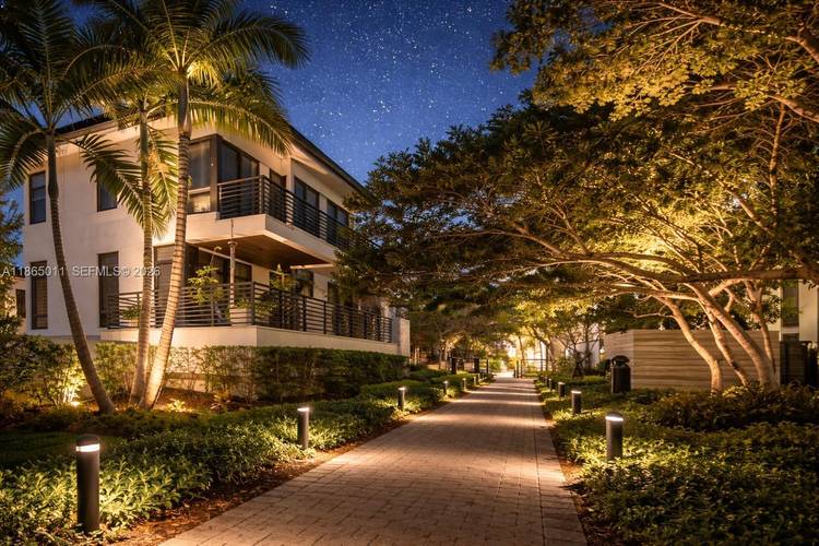 Discover LUXURY living in the heart of DOWNTOWN DORAL w this stunning FIJI model SINGLE FAMILY home in the exclusive community of CANARIAS.