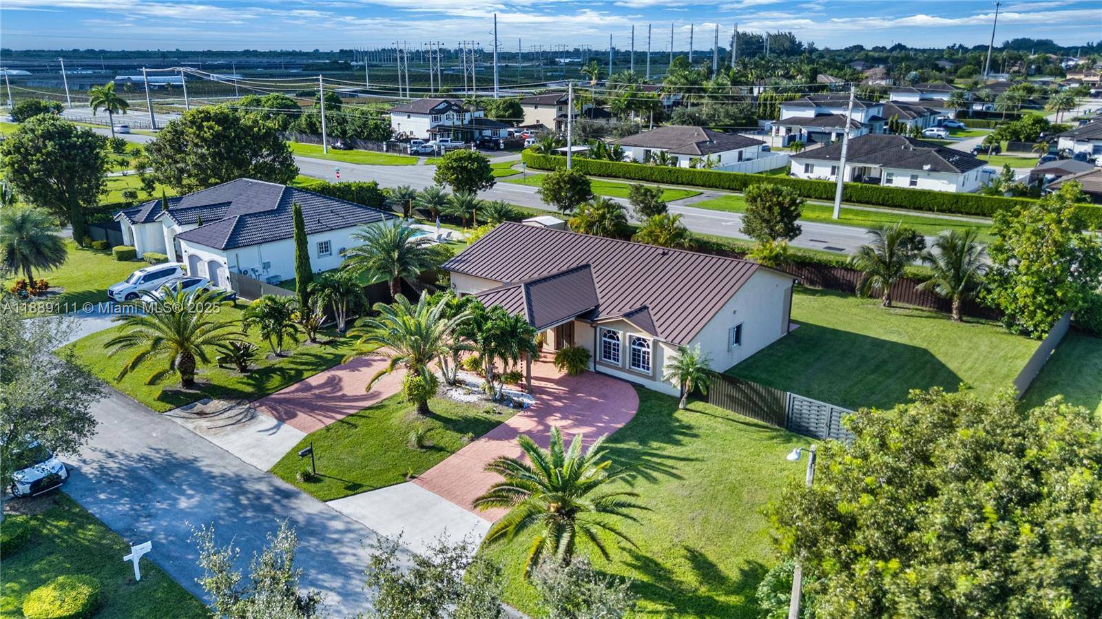 Welcome to this beautifully 4BR 2BA single family home situated on more than a 1 4 acre lot in a quiet, desirable area of Miami.