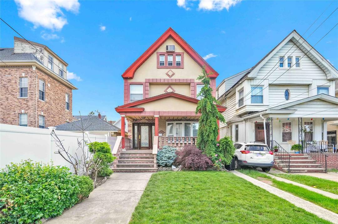 Welcome to this beautifully updated detached brick and stucco two family home, currently used as a spacious one family residence !