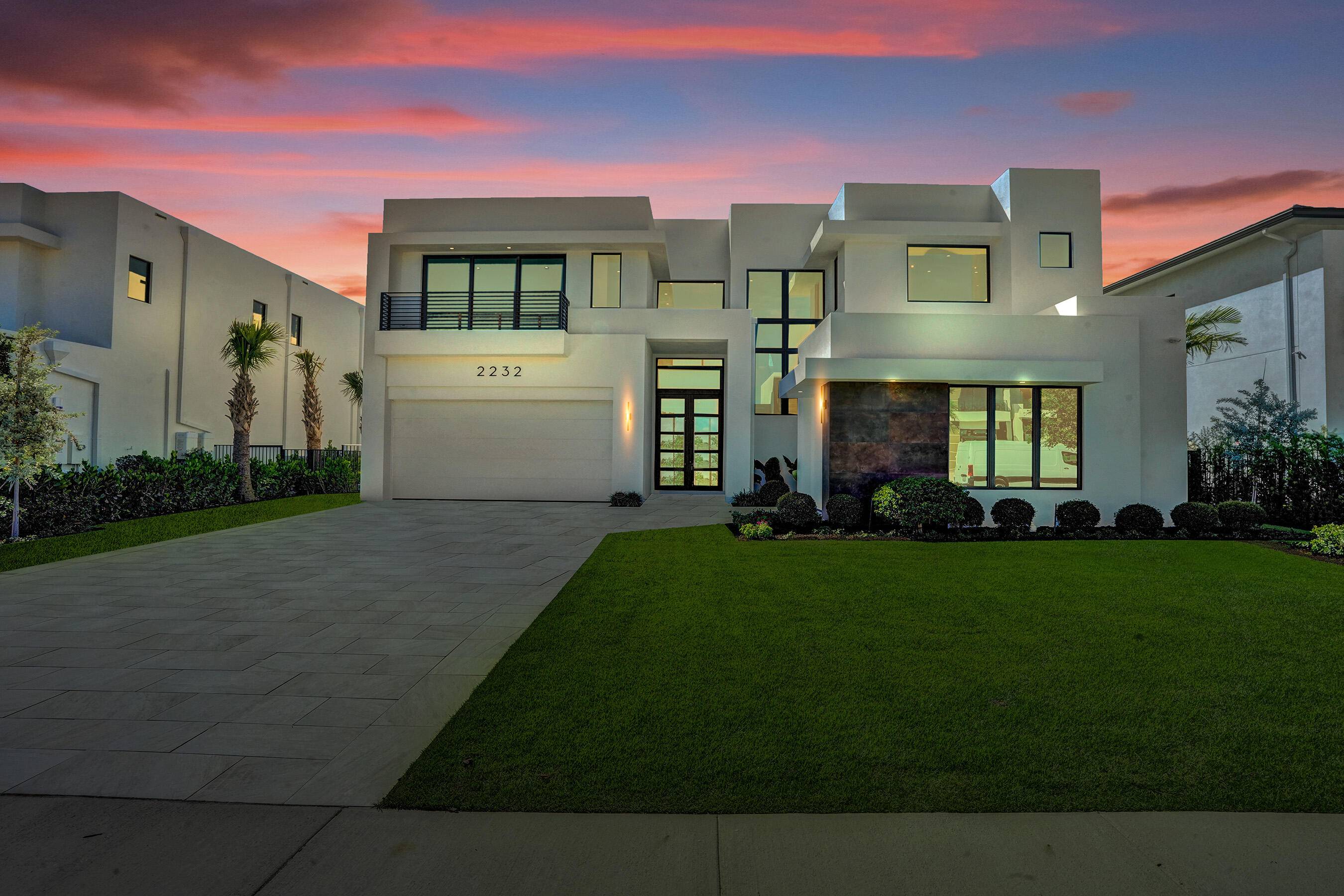 Welcome to your dream home in the exclusive, gated community of Delray Ridge, the only one in Pineapple Grove !